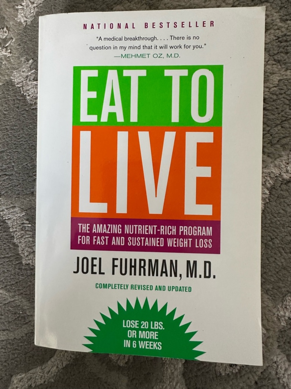 Eat to Live by Joel Fuhrman M.D. — White Cover with Green & Orange Block Text